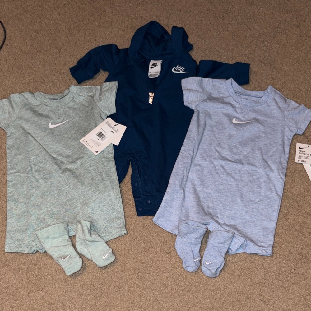 3 Nike Outfits and 2 pairs of socks